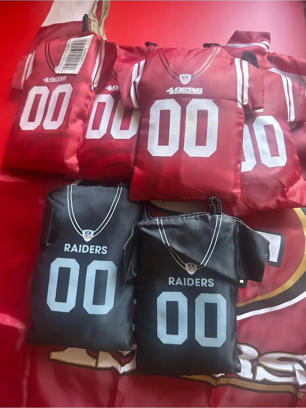 BUNDLE •2 NFL Raiders Nylon Travel Bag•4 NFL 49ers with Holographic NFL Shield•